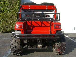 Red Yamaha Gas Golf Cart Lifted A Arm Off Road Tires Utility Basket Lights HiFi
