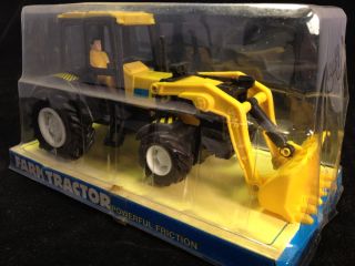 New Ray Farm Tractor Friction Powered Model with Driver Moving Parts