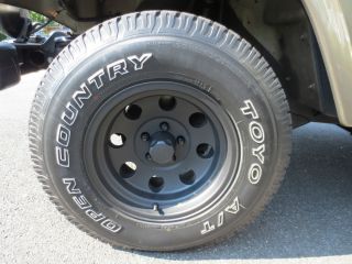 Jeep 15x7 American Racing Baja Wheels with 30" Toyo A T Tires