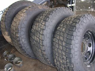 4 Nitto Terra Grappler All Terrain Tires Cragar Soft 8 Lug Wheels Rims 305 70 16