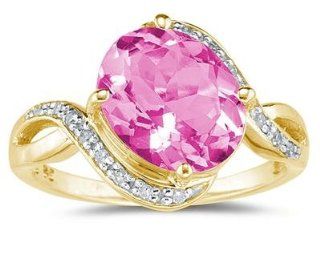 Oval Shaped Pink Topaz and Diamond Curve Ring in 10K Yellow Gold SZUL Jewelry